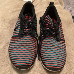 - Nike running shoes size 10